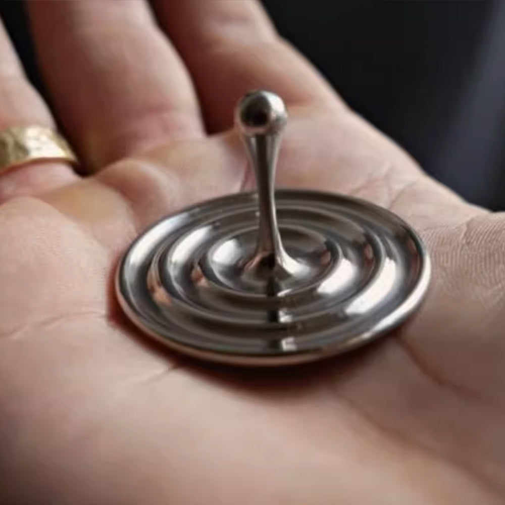 Elegant Teardrop Spinner – A Minimalist Kinetic Desk Toy